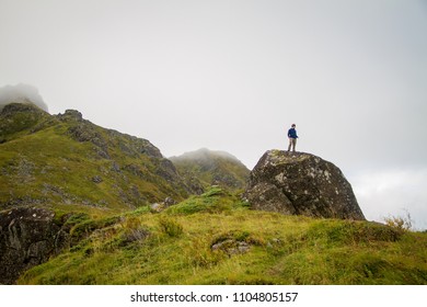 Hiker in the Clouds