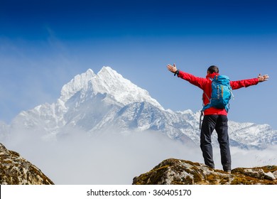 Hiker enjoying the view on the Everest trek in Himalayas, Nepal