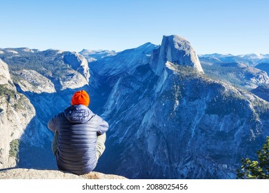 Hiker enjoying view, Yosemite National Park, California, USA