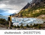 Hiker in front Grey Glacier in the Southern Patagonian Ice Field, Chile