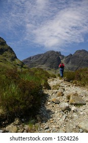 hiker going up the path