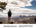 Hiker Looking Out From South Rim Trail in Big Bend National Park