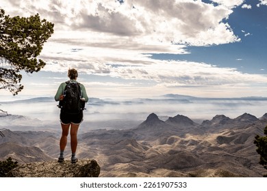 Hiker Looking Out From South Rim Trail in Big Bend National Park
