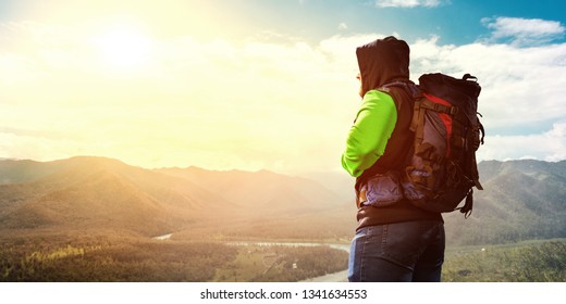 Hiker man in mountains. Mixed media - Shutterstock ID 1341634553
