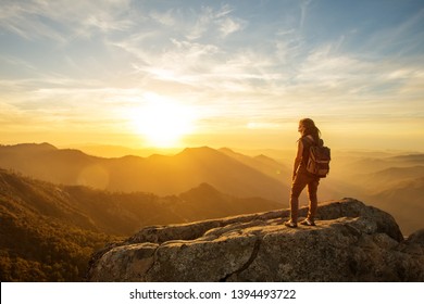 Hiker meets the beautiful sunset on the Moro rock in Sequoia national park, California, USA. - Powered by Shutterstock