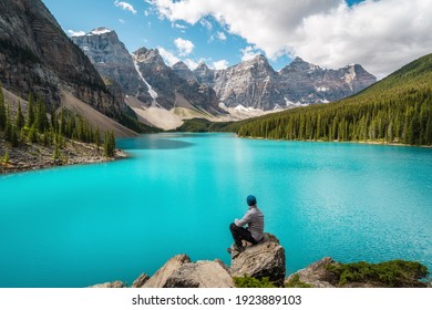 Hiker At Moraine Lake During Summer In Banff National Park, Alberta, Canada.