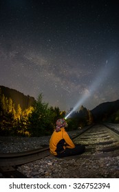 Hiker At Night, Wearing A Head Torch