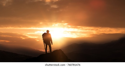 Hiker On Mountain Summit