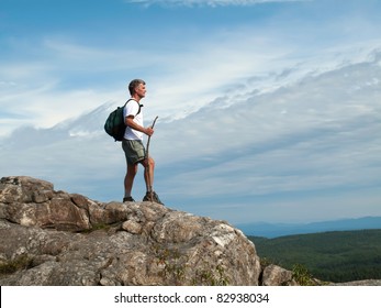 Hiker On The Mountaintop