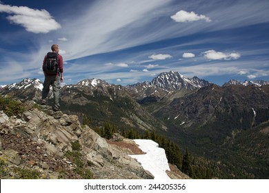 Hiker on the summit of Koppen Mountain. Cascade Mountains, WA.