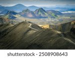 A hiker on a trail in Landmannalaugar, Icelandic Highlands, adventure concept, awe, nature