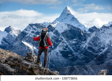 Hiker Posing At Camera On The Trek In Himalayas, Nepal