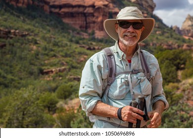 Hiker Posing In Desert Scene Cowboy Hat Adventure Portrait Strong Smiling Man Caucasian 