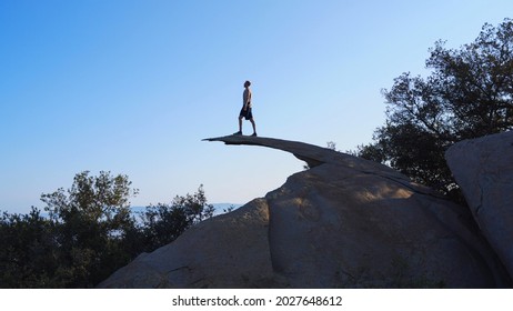 Hiker At Potato Chip Rock In California