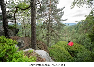 Hiker Setting Up His Tent For The Night.