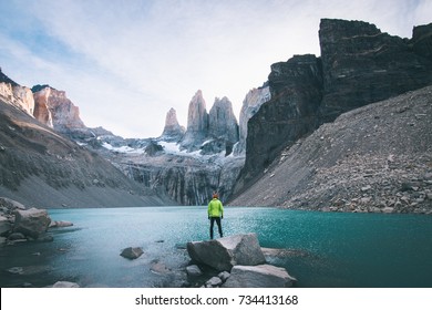 Hiker standing in front of Torres Del Paine Patagonia - Powered by Shutterstock