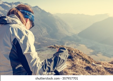 Hiker studying a map.
