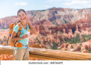 Hiker Sunscreen. Woman Hiking Putting Sunblock Lotion Outdoors During Summer Hike Holidays. Mixed Race Caucasian Asian Female Model. Bryce Canyon National Park, Utah, United States.