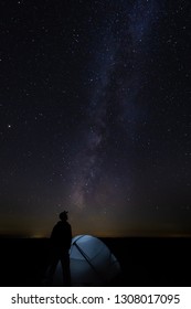 Hiker With Tent Gazing At Milky Way