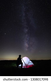 Hiker With Tent Gazing At Milky Way