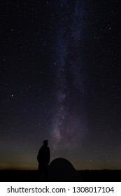 Hiker With Tent Gazing At Milky Way