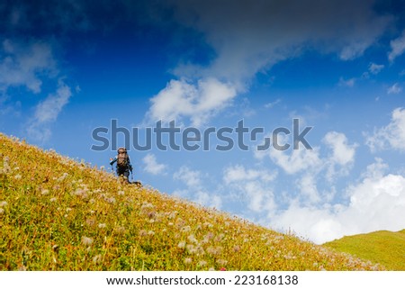 Similar – Image, Stock Photo Four people standing in a row on a ridge (2/2)