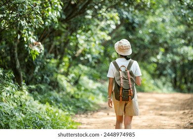 Hiker woman walk in autumn fall nature forest - Powered by Shutterstock