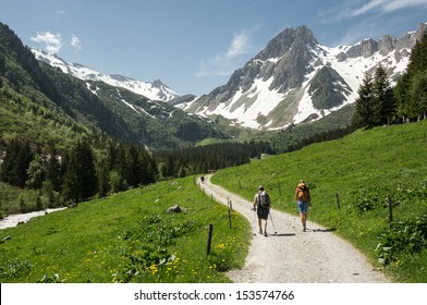 Hikers In The Alps, France (Tour Du Mont Blanc)