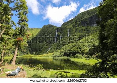 Hikers enjoy the silence with the view of the idyllic lagoon and waterfalls Poço da Alagoinha on the island of Flores in the Azores.
What a paradise!
Flores, Azores - in the Atlantic Ocean
