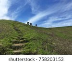 Hikers going up Max Patch in North Carolina