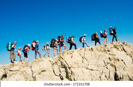 Hikers Group Trekking In Crimea Mountains