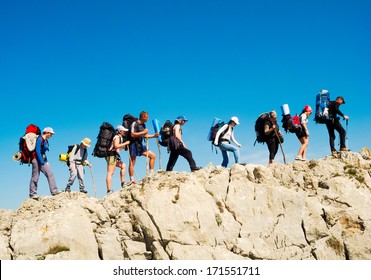 Hikers Group Trekking In Crimea Mountains