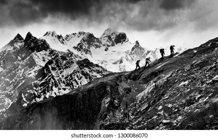 Hikers At Himachal Trekking Through The Treacherous Mountains Of HImalaya