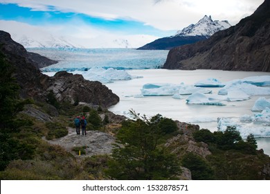 Hikers Infront of Glacier Grey, Torres del Paine National Park, Chile. Global Warming Motif