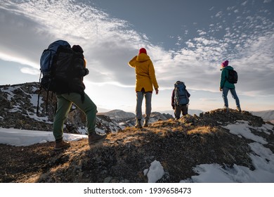 Hikers or tourists are relaxing on mountain top - Shutterstock ID 1939658473