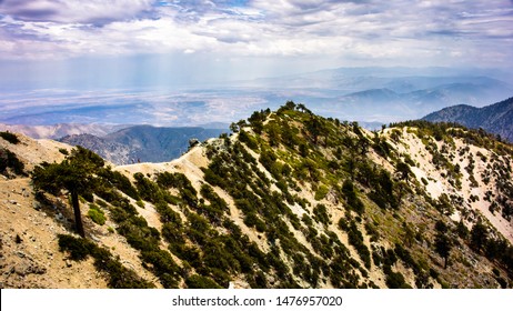 Hikers Traverse Devil's Backbone Trail - Extreme Wide Shot