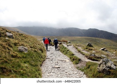 Hikers walking up Snowdon Wales