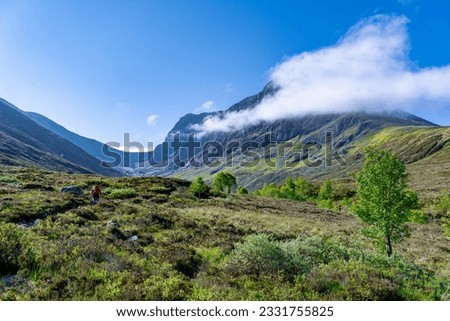 Hikers Walking Towards Ben Nevis in Scotland United Kingdom Hiking Via the North Face Route