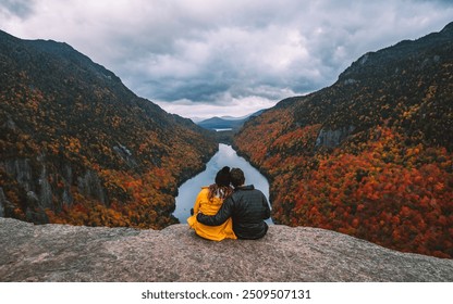 Hiking Adventure Couple Hold Each Other On Top of Mountain Autumn Fall Foliage Indian Head Adirondacks at Sunset. Relationship Love Travel Landscape - Powered by Shutterstock