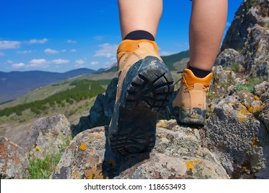 Hiking Boot Closeup On Mountain Rocks