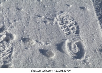 Hiking Boot Footprint In The Snow