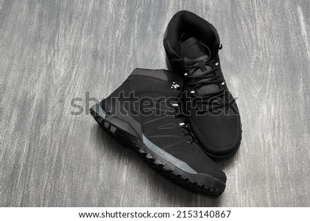 Hiking boots for men or women who want to do mountain walks with a firm anti-slip sole that gives stability and freedom of movement for adventure on vacation or weekend	