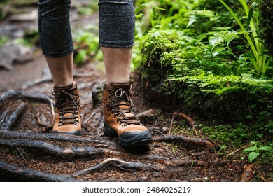 Hiking boots on trekking trail in forest. Outdoor waterproof leather shoes - Powered by Shutterstock