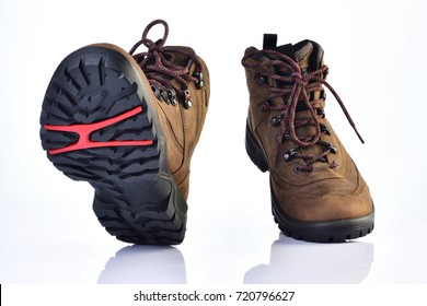 Hiking boots step with backgroud isolate.