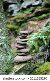 Hiking Cairn By A Forest Stream