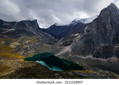 Hiking and camping in the remote Tombstone Territorial Park, Yukon, Canada. Beautiful fall colors. - Shutterstock ID 2211318907