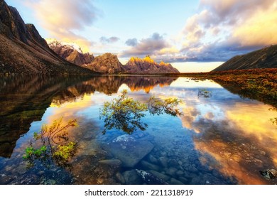 Hiking and camping in the remote Tombstone Territorial Park, Yukon, Canada. Beautiful fall colors. - Shutterstock ID 2211318919
