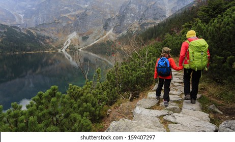 Hiking - Family On Mountain Trek