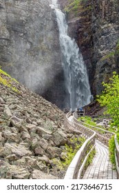 Hiking Footbridge To A Beautiful Waterfall In A Mountain Canyon