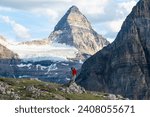 Hiking Girl and Mount Assiniboine from the Nub Peak, Mount Assiniboine Provincial Park, British Columbia, Canada